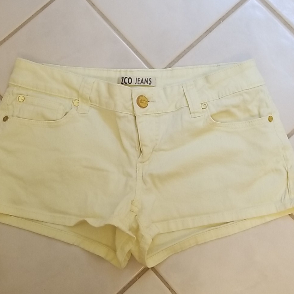 Gently used light yellow short shorts